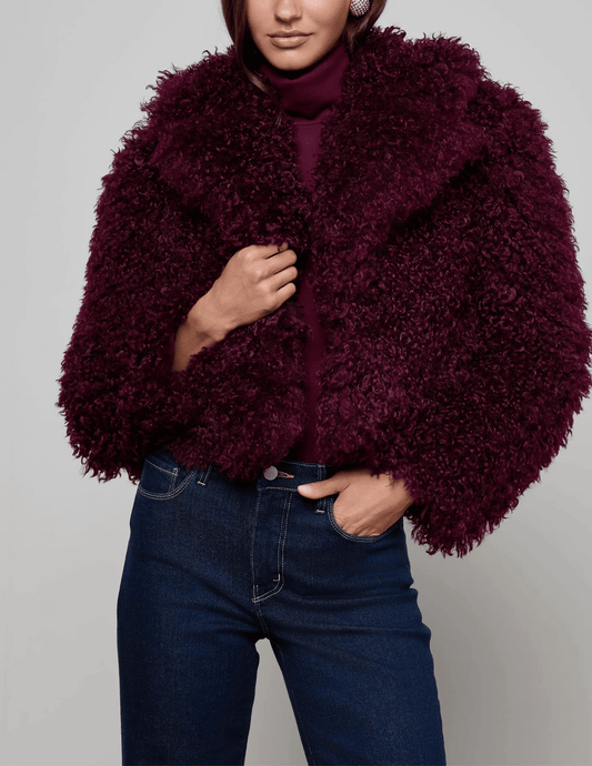 Front view of L’AGENCE Aura Crop Faux Fur Jacket in Primitivo.”