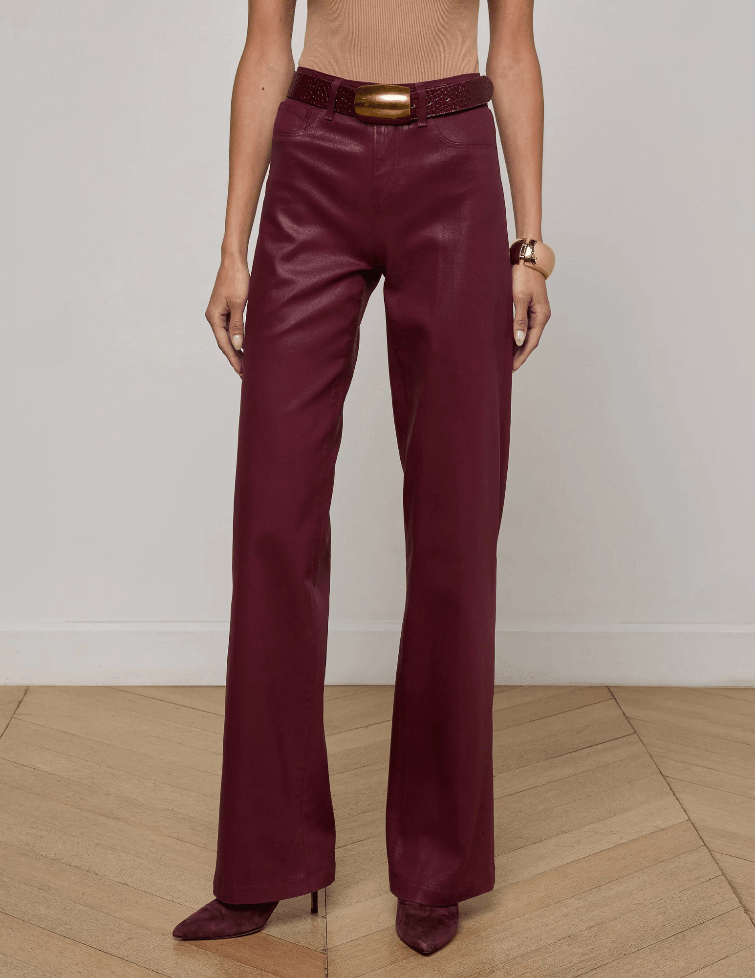 Front view of L’AGENCE Clayton High Rise Wide Leg Coated Jeans showing wide leg silhouette