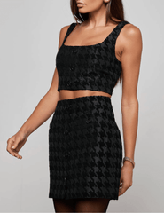 Side view of L’AGENCE Maylin Bralette Top featuring exposed zipper and cropped silhouette.