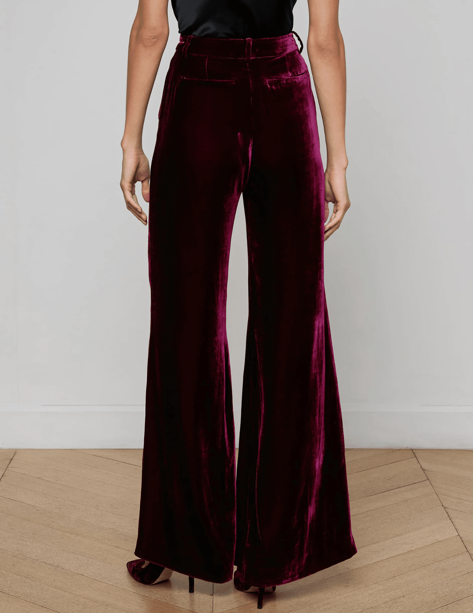 Back view of Pilar Velvet Pant showing contoured waistband and welt pockets