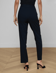 Back view of L’AGENCE Rebel trouser in midnight ivory pinstripe with high-waisted fit