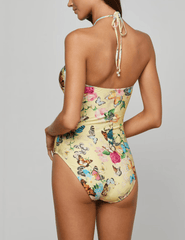 Back view of L’AGENCE Shiva one piece swimsuit in yellow butterfly print