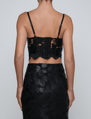 Back view of L’AGENCE Sonya black vegan leather lace bustier