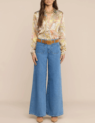 L'AGENCE Tyler Green Multi Cluster Paisley blouse styled with wide-leg jeans