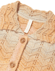 Chevron knit detail of Zimmermann Tallow Kid's Top in Multi Ombre with scalloped hem