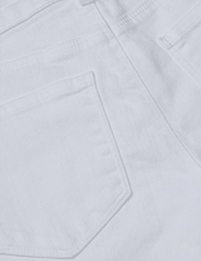 L'AGENCE Cara Low-Rise Bootcut Jeans in Blanc