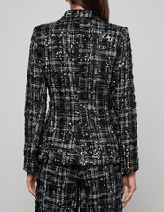 back view of 'AGENCE Colin Sequin Tweed Double Breasted Blazer in Black Ivory Tweed