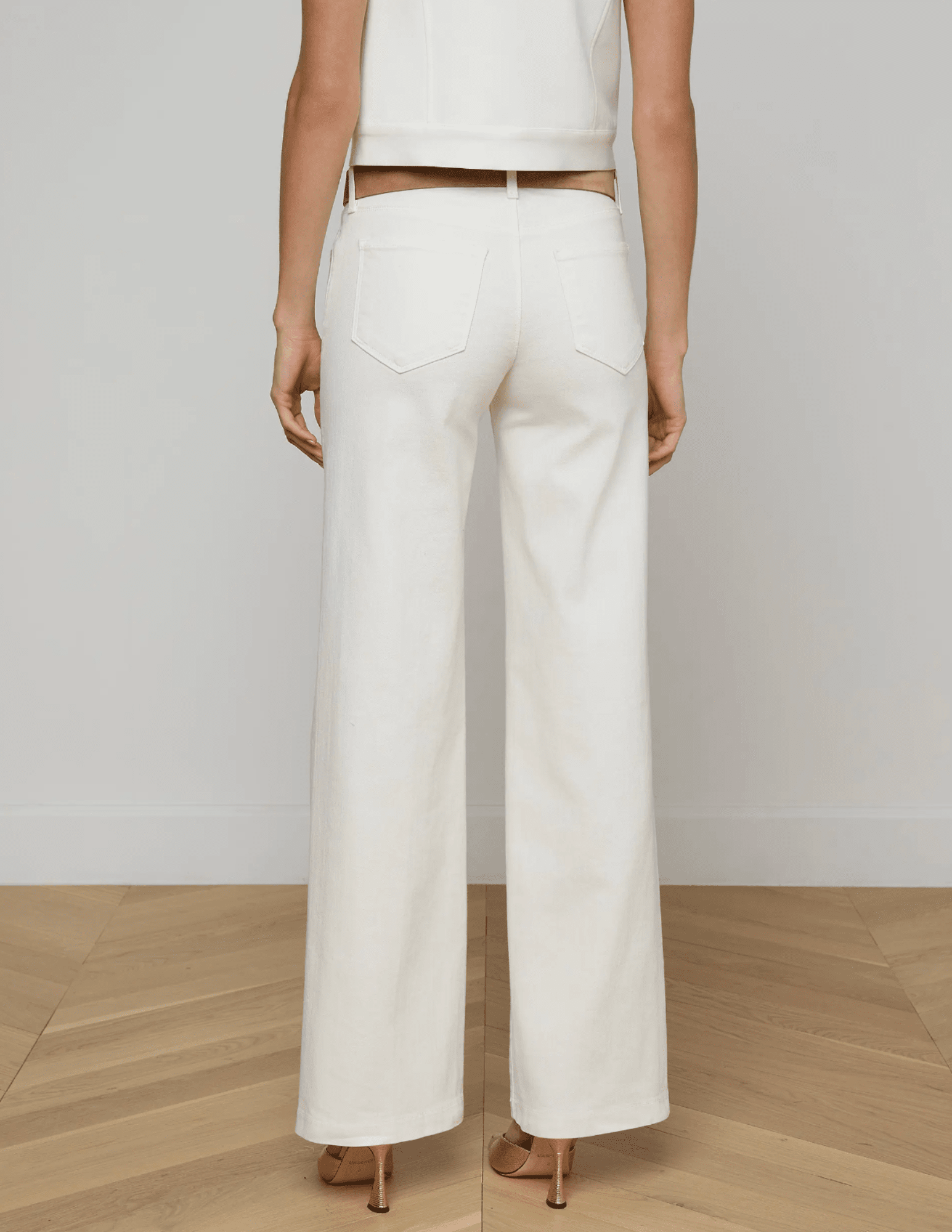 Back view of L'AGENCE Joanne Low Rise Wide Leg Jeans in Light Ecru