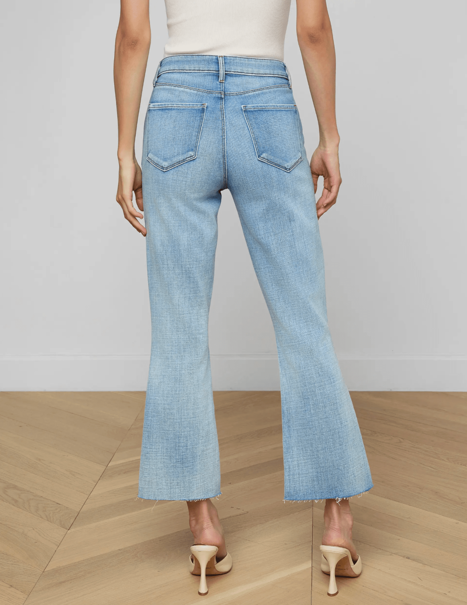 Back view of L'AGENCE Kendra High Rise Crop Flare Jean in Dry Ice