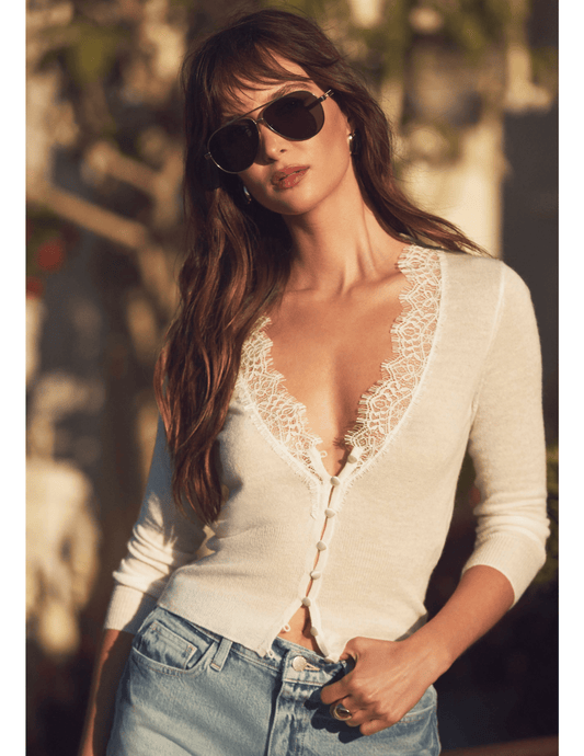 Editorial view of L'AGENCE Eluna lace trim cardigan in ivory