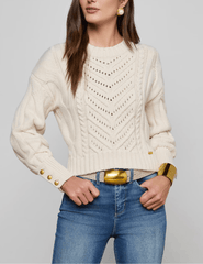 Front view of LAGENCE Storm Cable Knit Sweater in Ivory