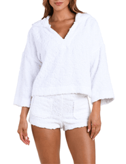 Front view of L’AGENCE Lee Terry Cropped Hooded Poncho in ornate white