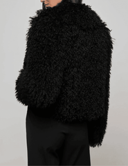 Side view of L'AGENCE Aura Crop Faux Fur Jacket in Black