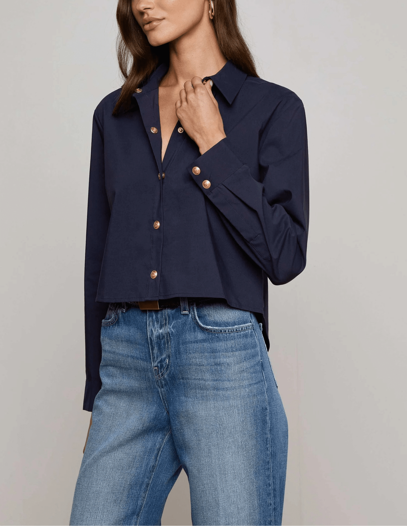 Side View Of L'AGENCE Cosette Cropped High Low Blouse in Midnight
