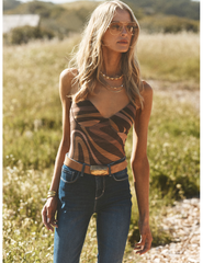 Model wearing L'AGENCE Elowen Underwire Mesh Bodysuit in Sepia Abstract Swirl outside