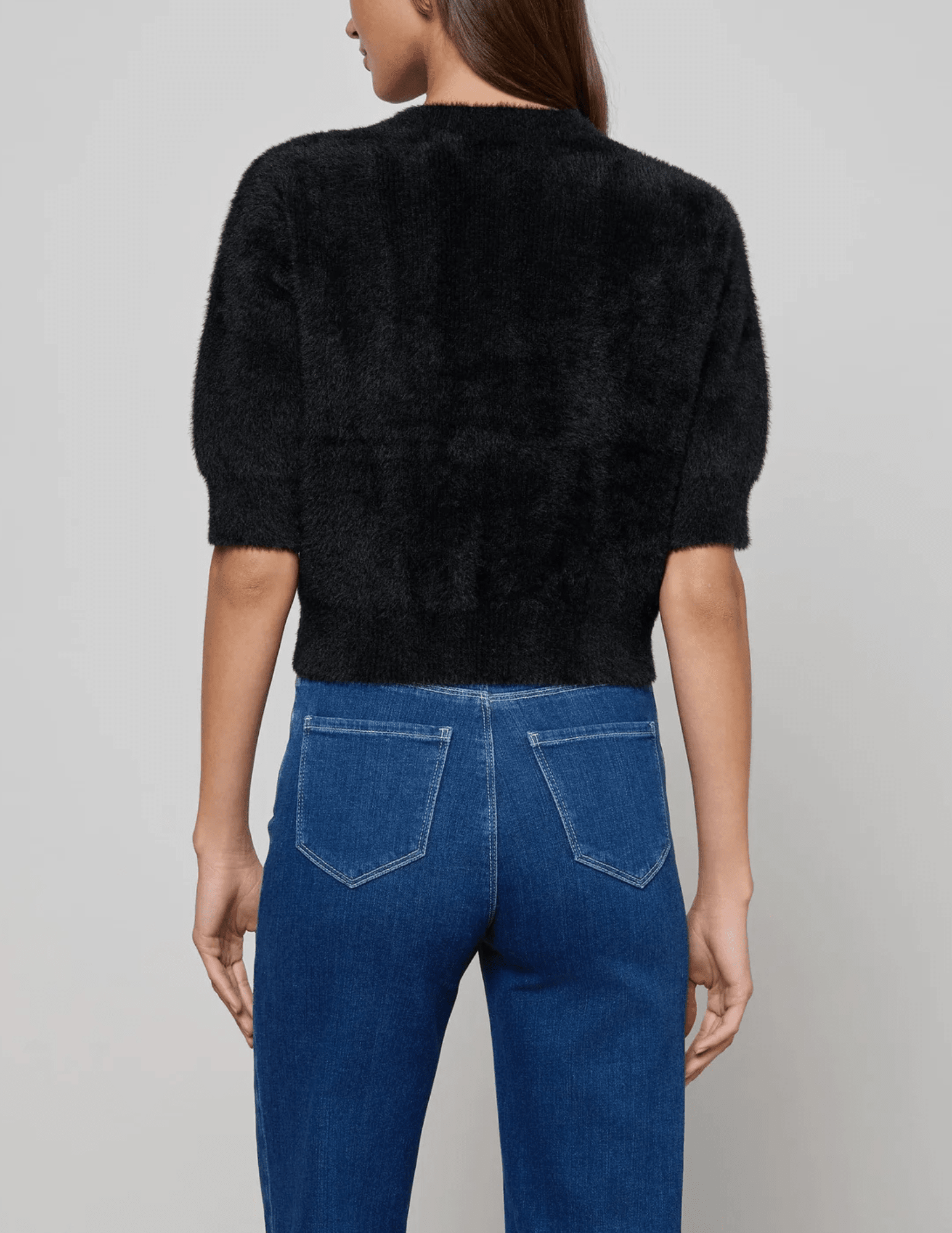 Back view of L'AGENCE Guinevere Short Sleeve Crop Sweater in Black
