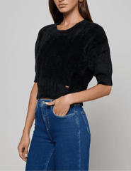 Side view of L'AGENCE Guinevere Short Sleeve Crop Sweater in Black