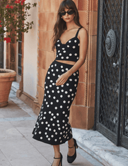L'AGENCE Mae Knit Flare Skirt in Black Ecru Polka Dot editorial