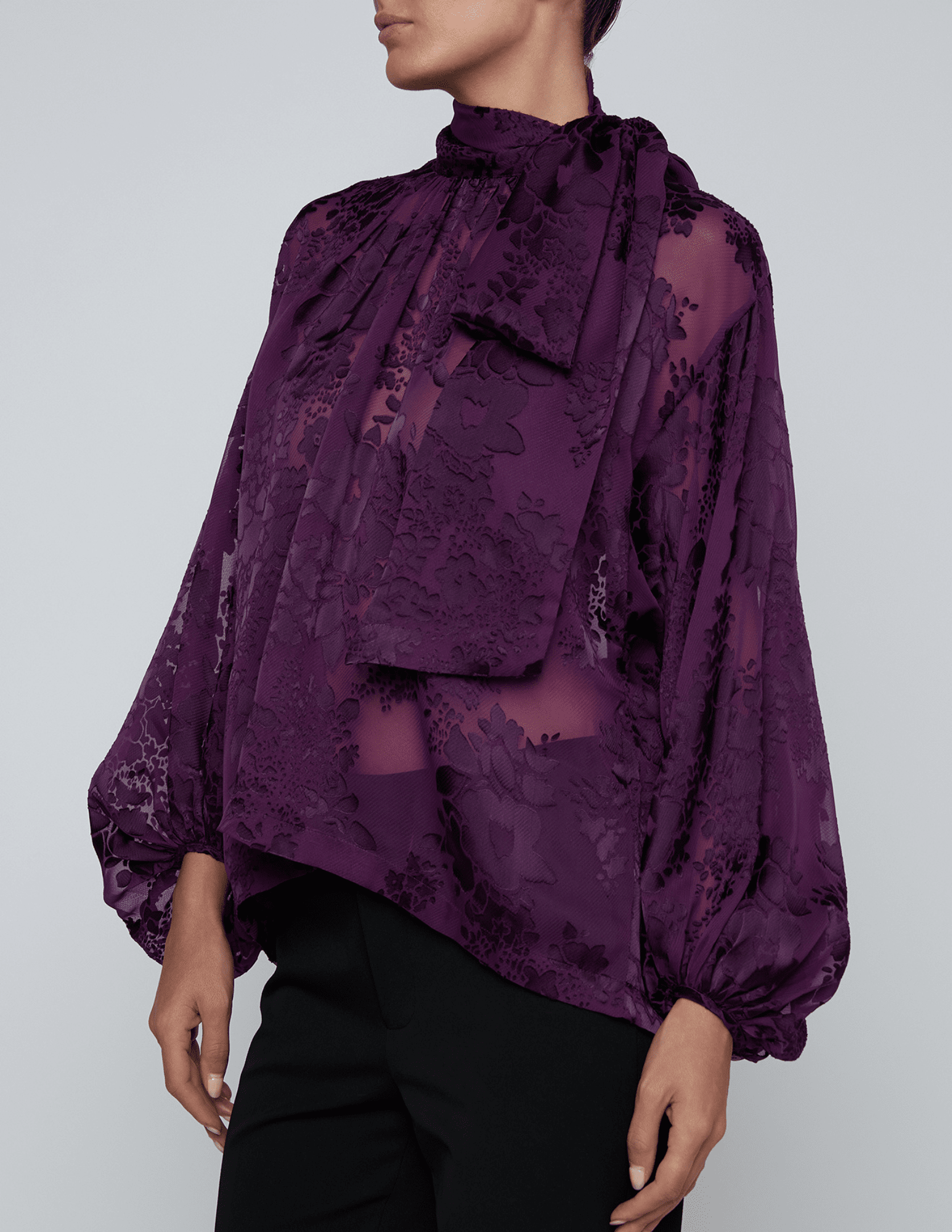 Side view of L'AGENCE Rhett Lace Oversized Blouse in Medium Violet
