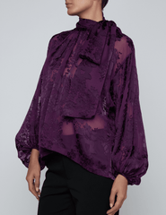 Side view of L'AGENCE Rhett Lace Oversized Blouse in Medium Violet
