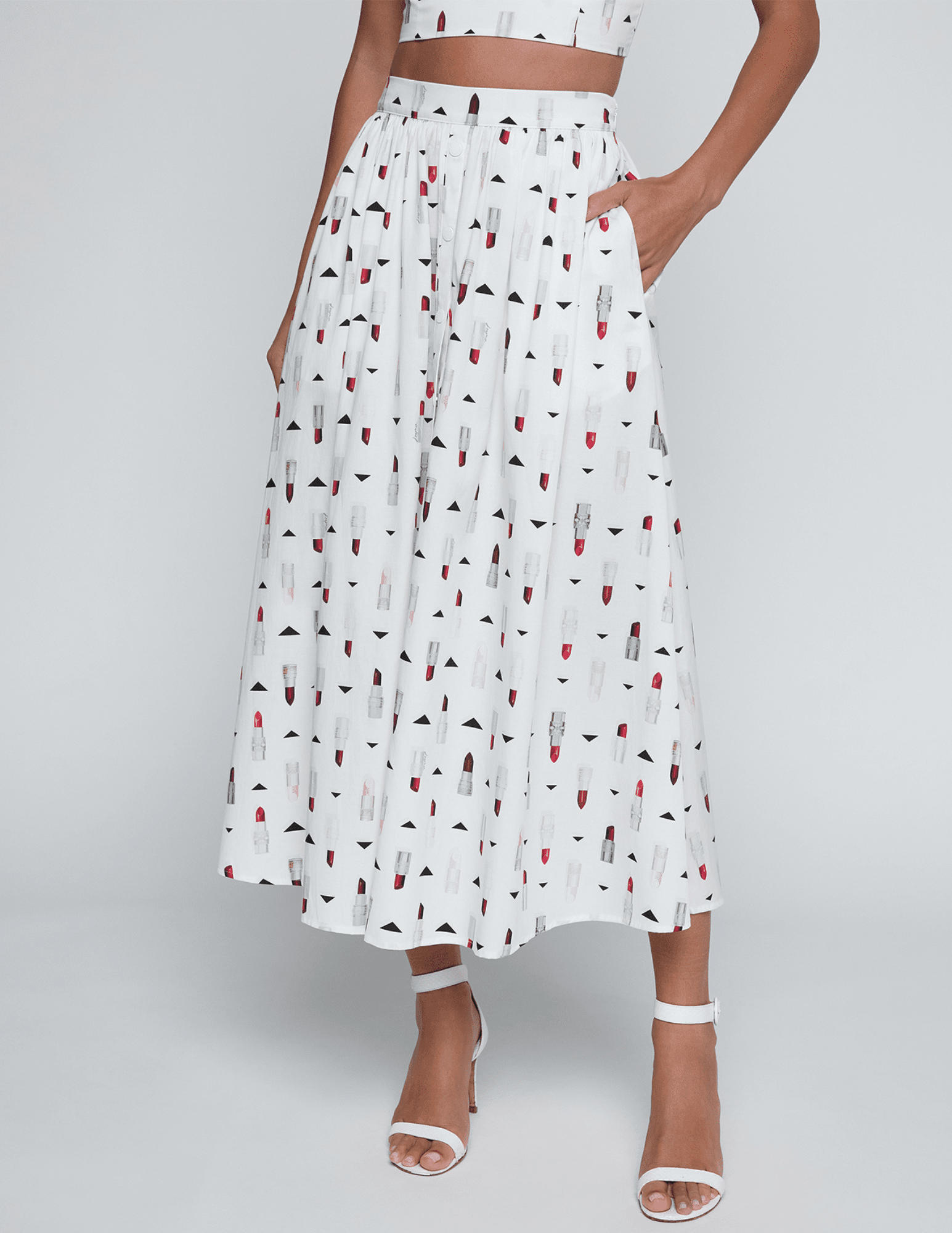 Front view of L'AGENCE Seina Poplin Midi Skirt in Ivory Multi Lipstick Geo