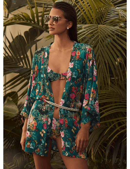 Model wearing L’AGENCE Yazmin Bralette Bikini Top styled for resort