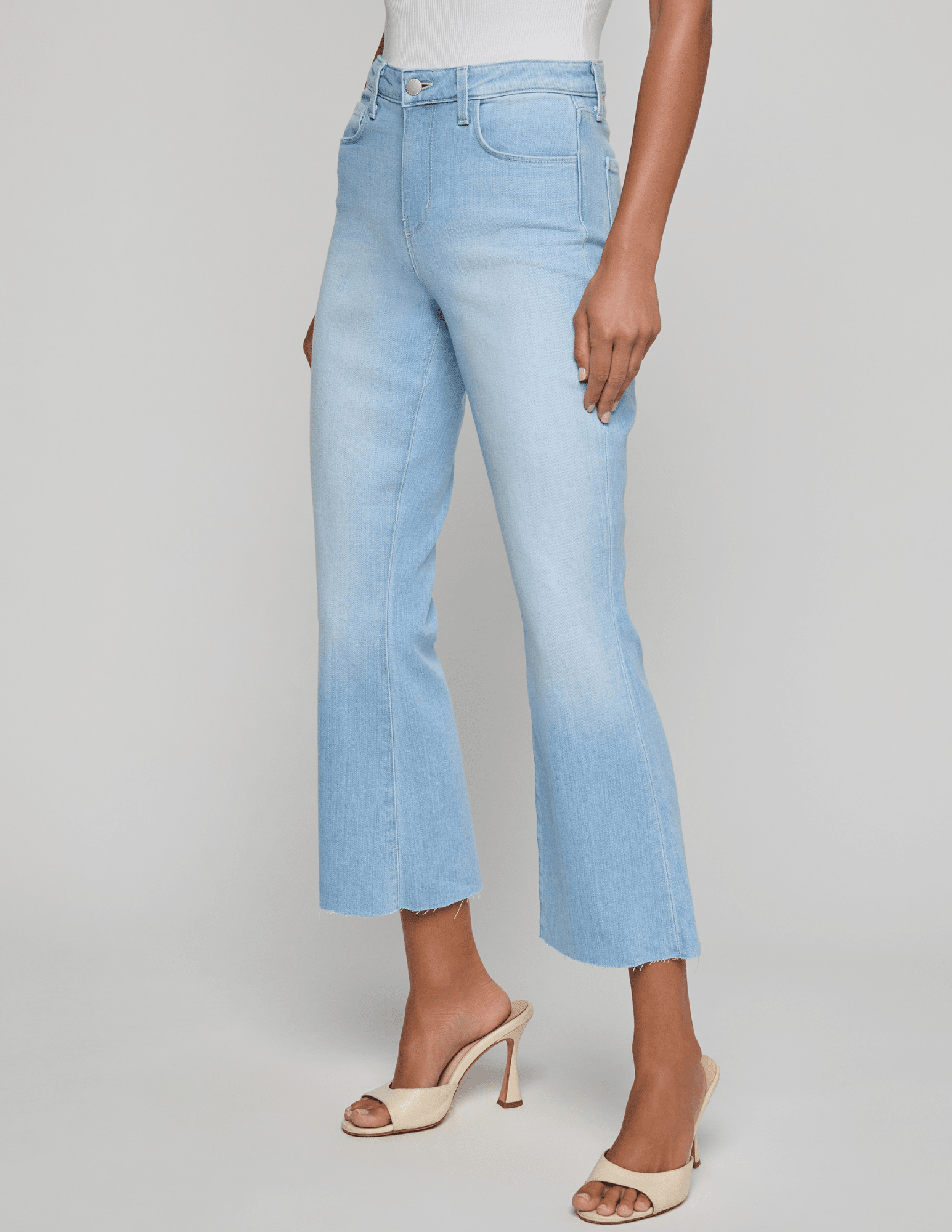 Side view of view of L'AGENCE Kendra High Rise Crop Flare Jean in Bayridge