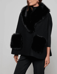 Side view ofL'AGENCE Chana Faux Fur Collar Cape in Black
