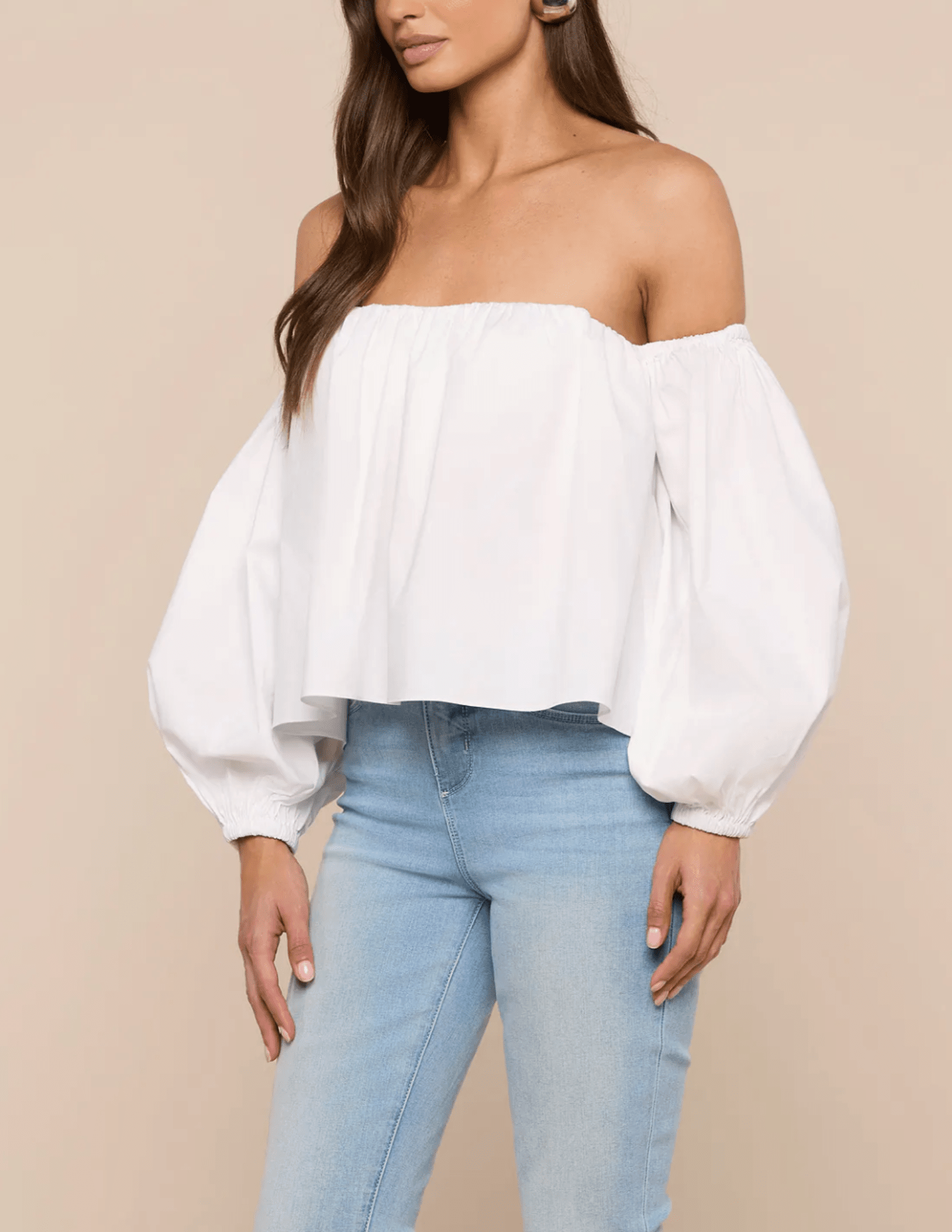 Side view of L'AGENCE Sarai Off Shoulder Puff Sleeve Top in White