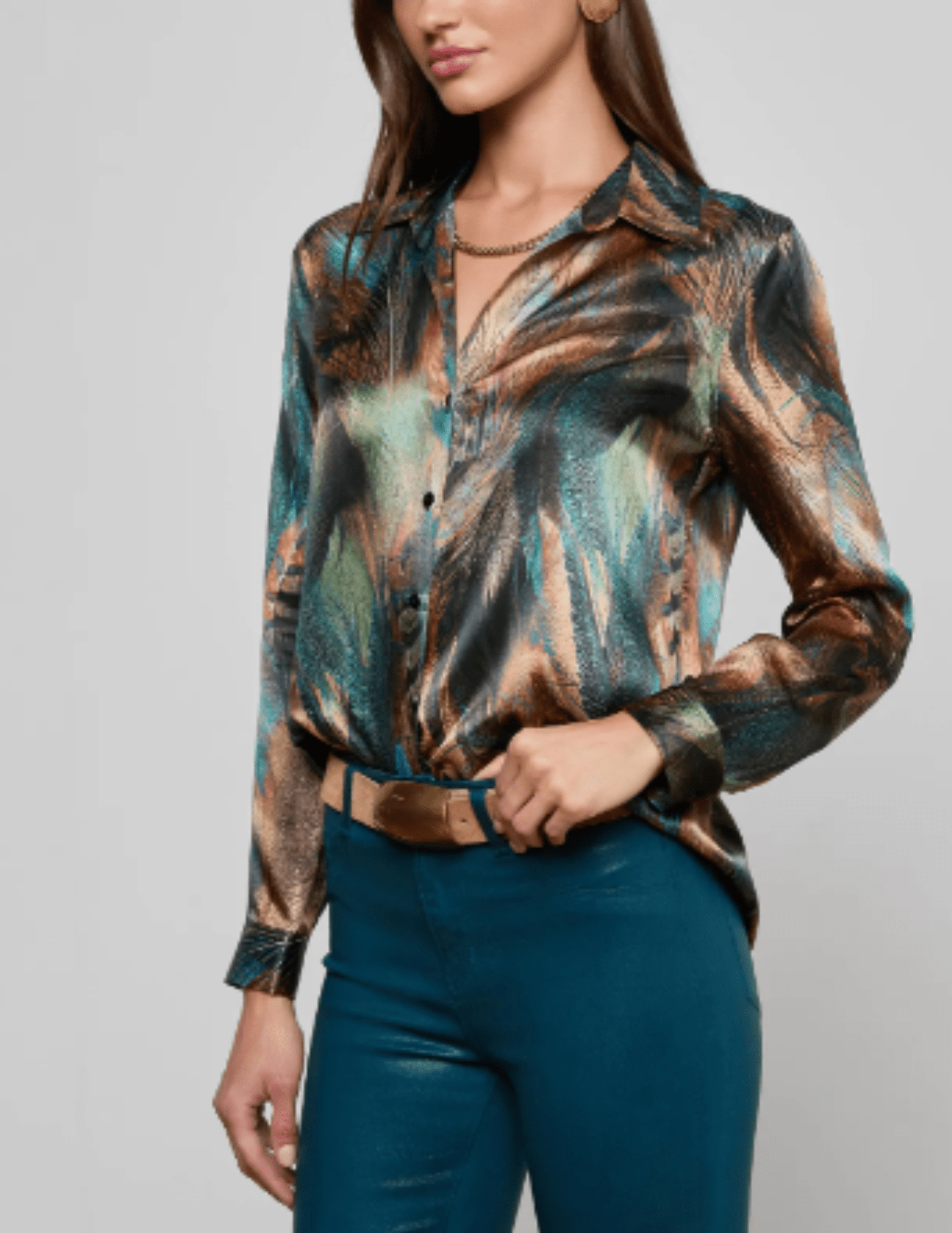 SIde view of The L’AGENCE Tyler Long Sleeve Silk Blouse in Teal Multi Mix Feather