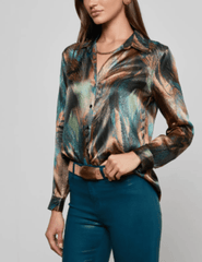 SIde view of The L’AGENCE Tyler Long Sleeve Silk Blouse in Teal Multi Mix Feather