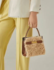 Austin Blaze Audrey Sherpa Top Handle Bag in hand