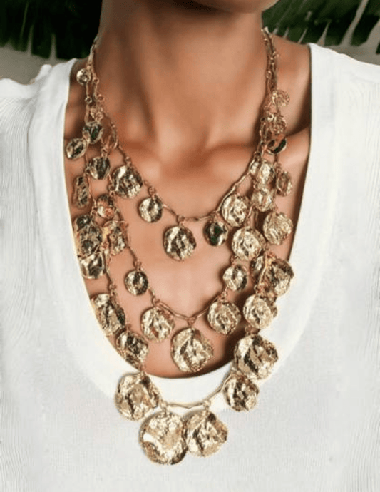 Layered bohemian gold coin charm necklace with adjustable lengths"