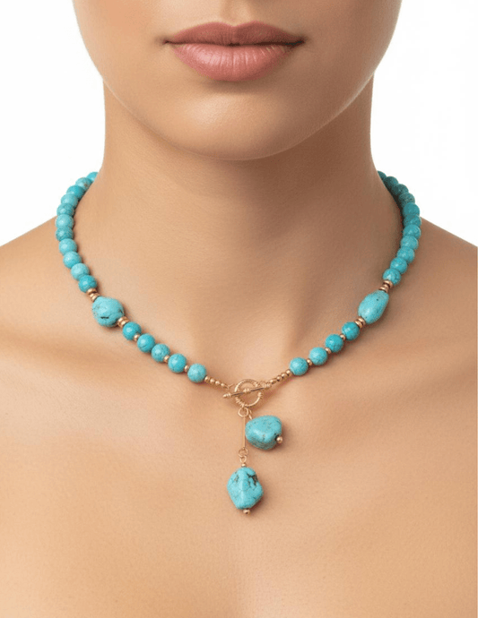 Model wearing Austin Blaze Lina Turquoise Necklace with gold-tone details
