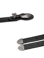 Close-up of antique silver-tone details on Lottie belt