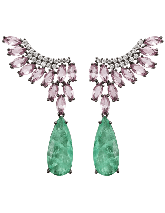 Pair of earrings with pink gemstones and green teardrop stones on a white background