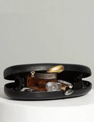 Austin Blaze Pimm sculptural clutch in black vegan leather open