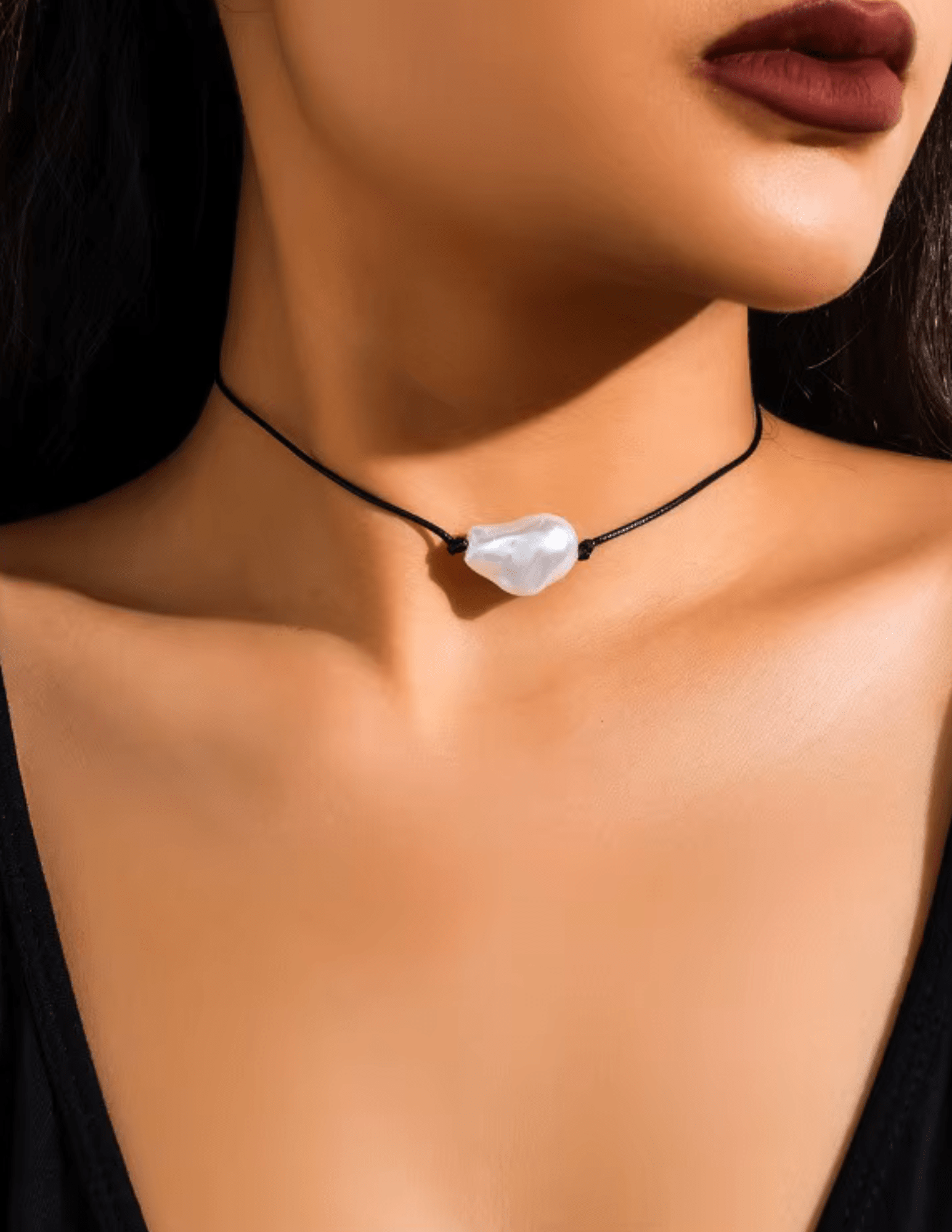 Model wearing St. Barths Gabby black pearl lariat necklace