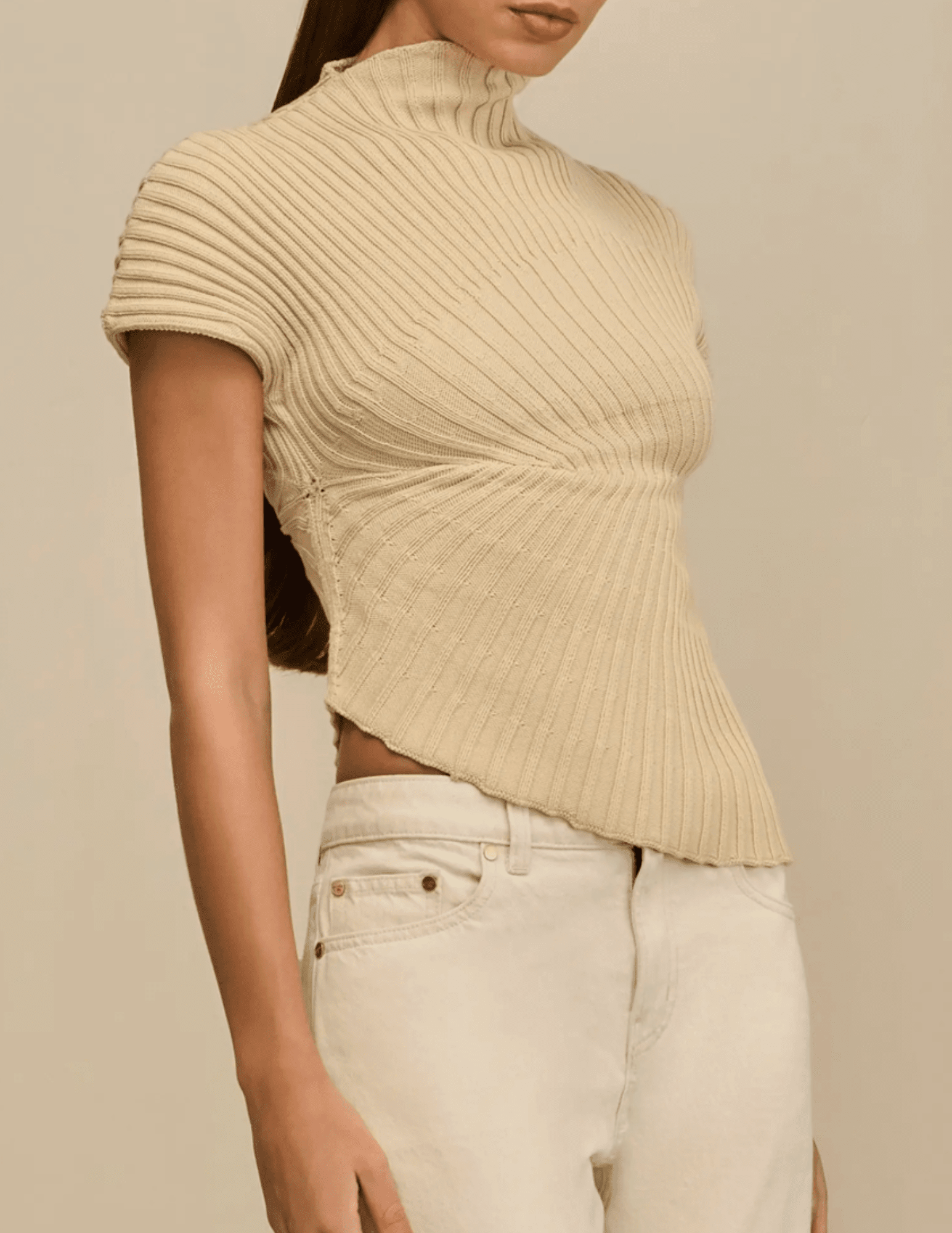Side view of Cult Gaia Annemie top in Beach with radial stitching