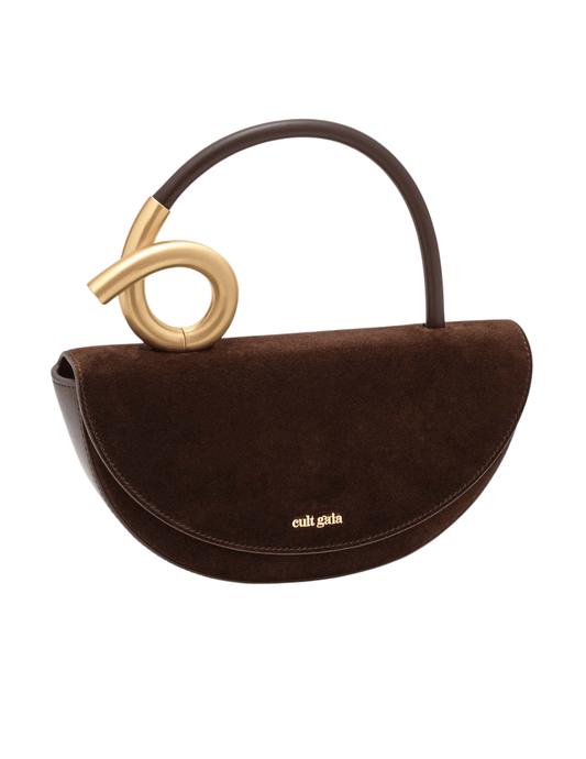 Side view of structured suede top handle bag in Dark Java.