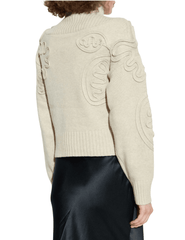 Back view of Cult Gaia Deva Knit Sweater in neutral Beach color