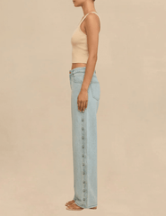 Side view of the Cult Gaia Elphie Low Rise Studded Jeans in Vintage Warm