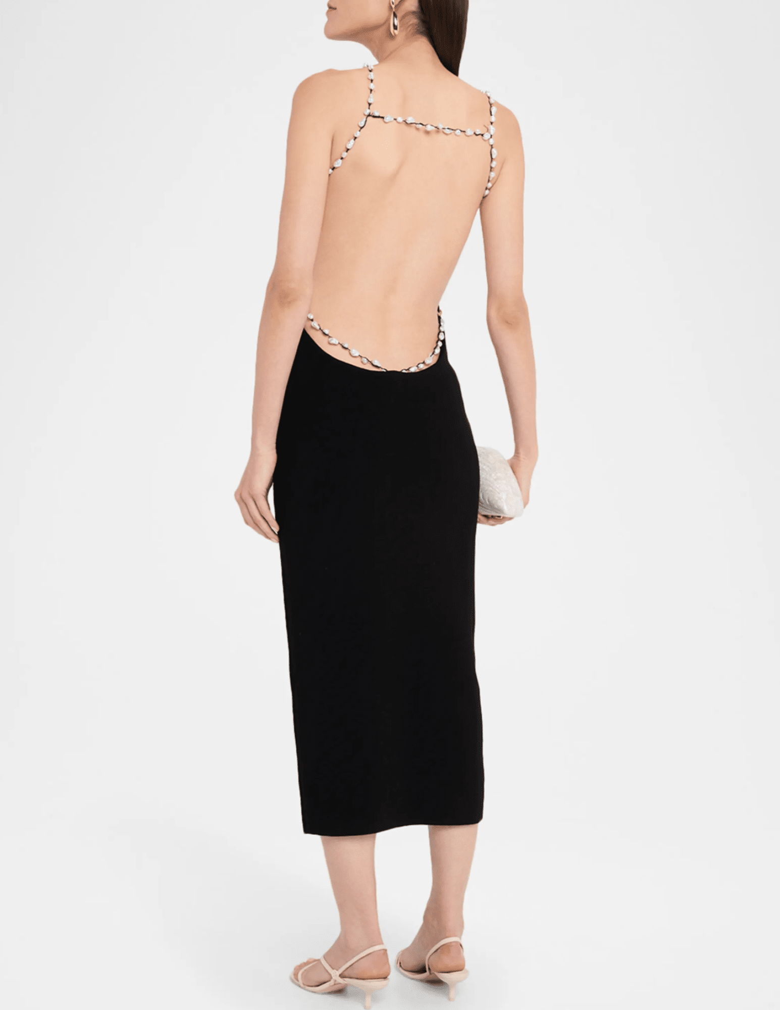 Back view of Cult Gaia Cassi Knit Midi Dress with open back and pearl straps