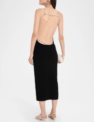 Back view of Cult Gaia Cassi Knit Midi Dress with open back and pearl straps