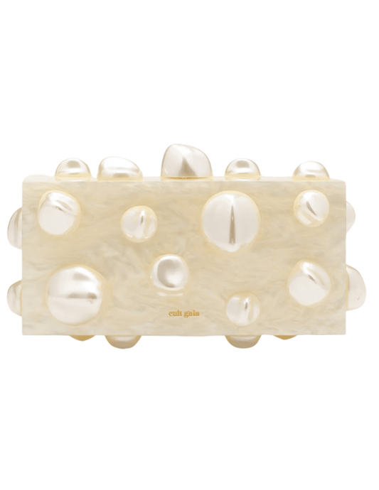 Cult Gaia Orbs Clutch in ivory pearlized acrylic with abstract orb design