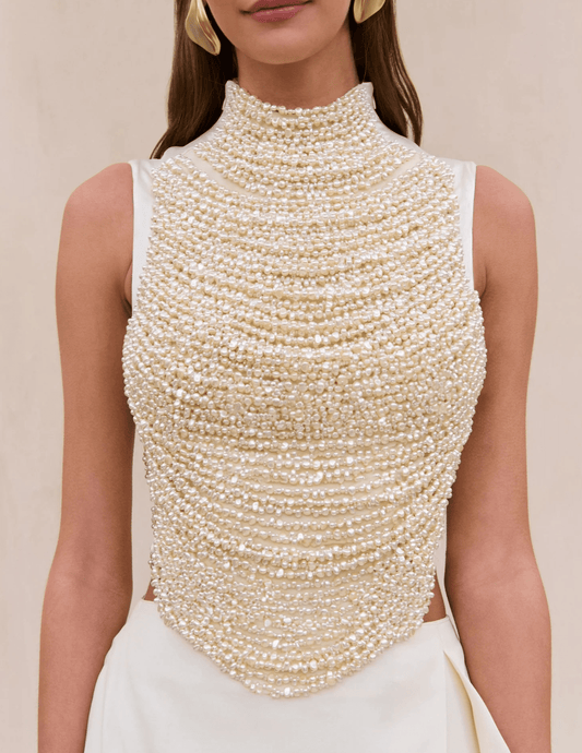 Close-up of hand-beaded faux pearl detailing on Cult Gaia Taraji Top