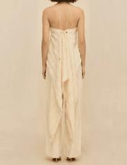 Back view of the Cult Gaia Venezia Halter Cascade Top in Off White showcasing the cascading fringe hem