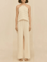 Front view of the Cult Gaia Venezia Halter Cascade Top in Off White worn on a model