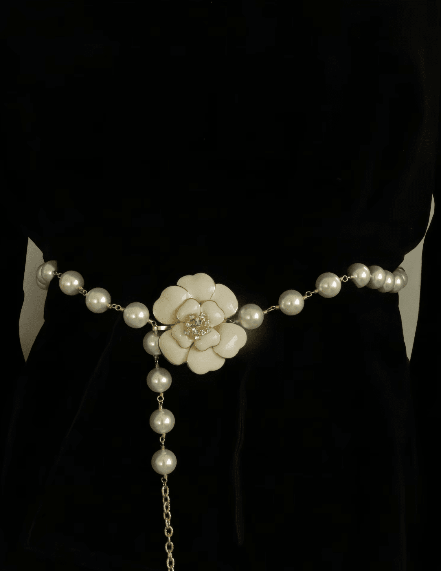 Ivory pearl chain belt with rhinestone camellia pendant and gold-tone metal details