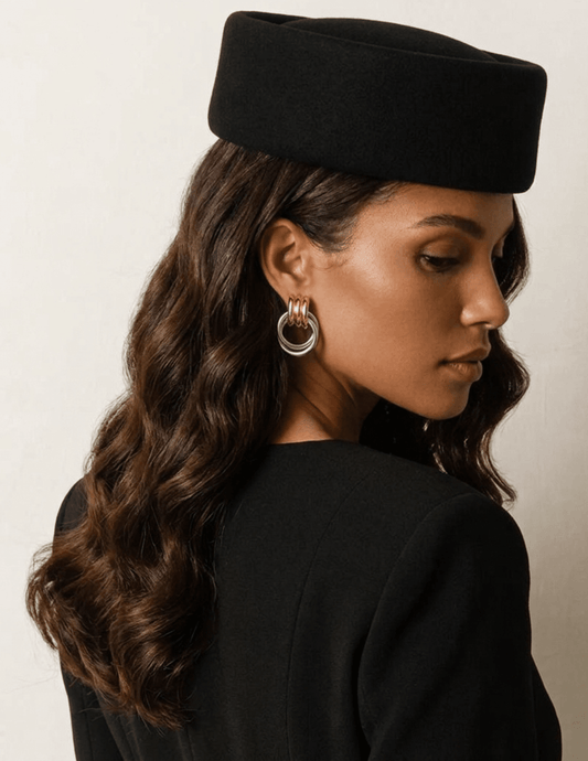 Fleur de Camélia Madeline Pillbox Hat in Black on model
